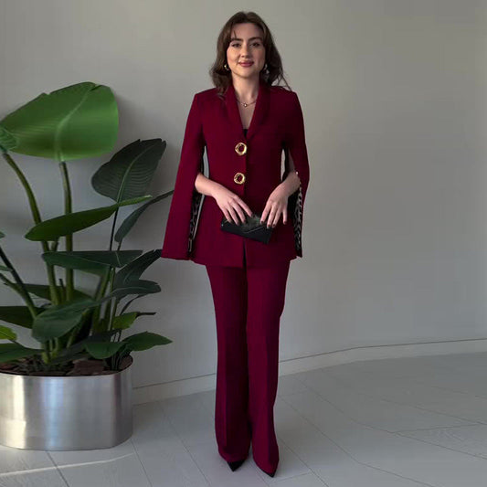 Elegant tvådelat set för damer med blazer med delade ärmar och byxor